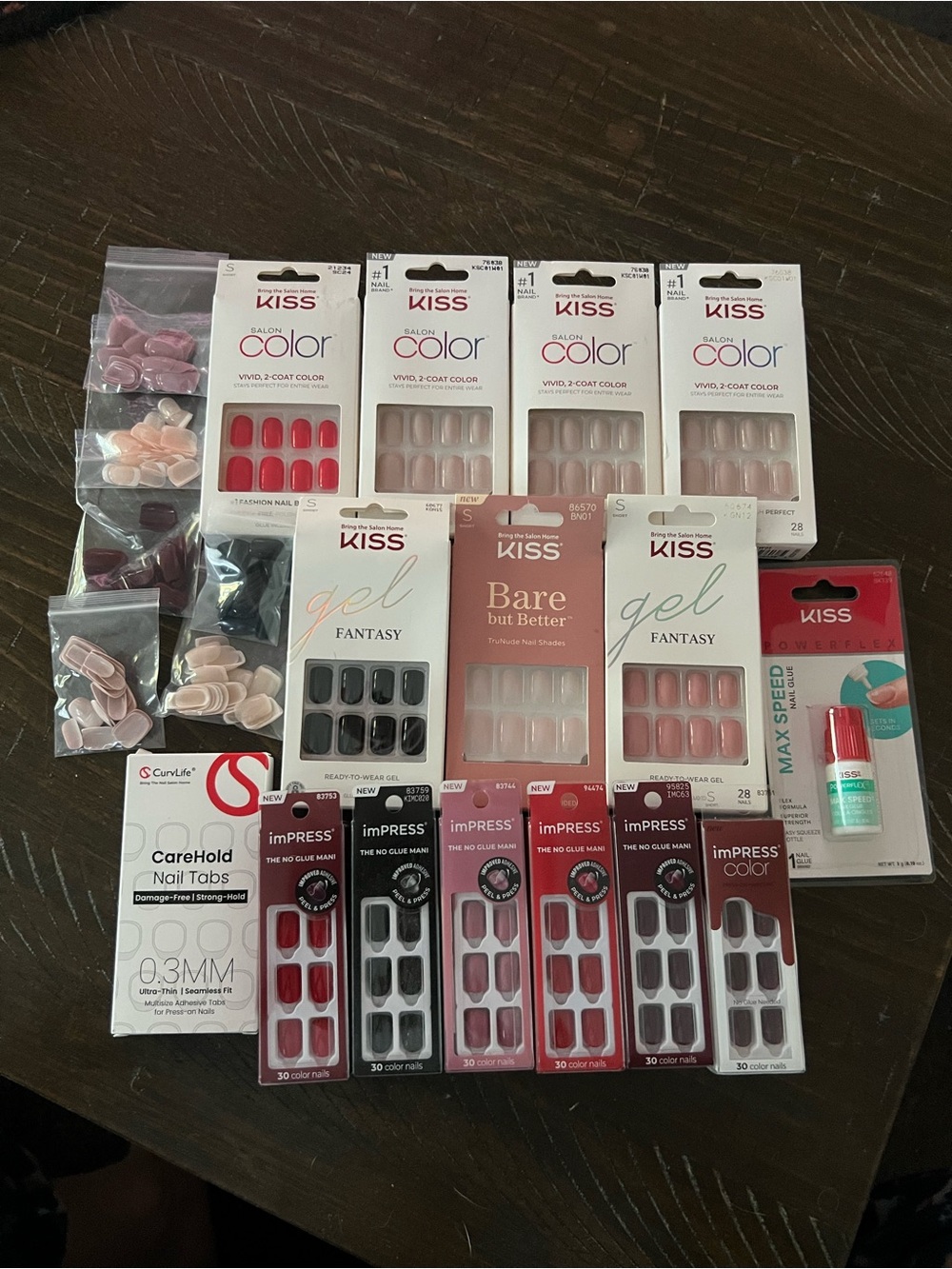 KISS Assorted Press-On Nail bundle of 19 sets in Pink, Nude, red, French & black